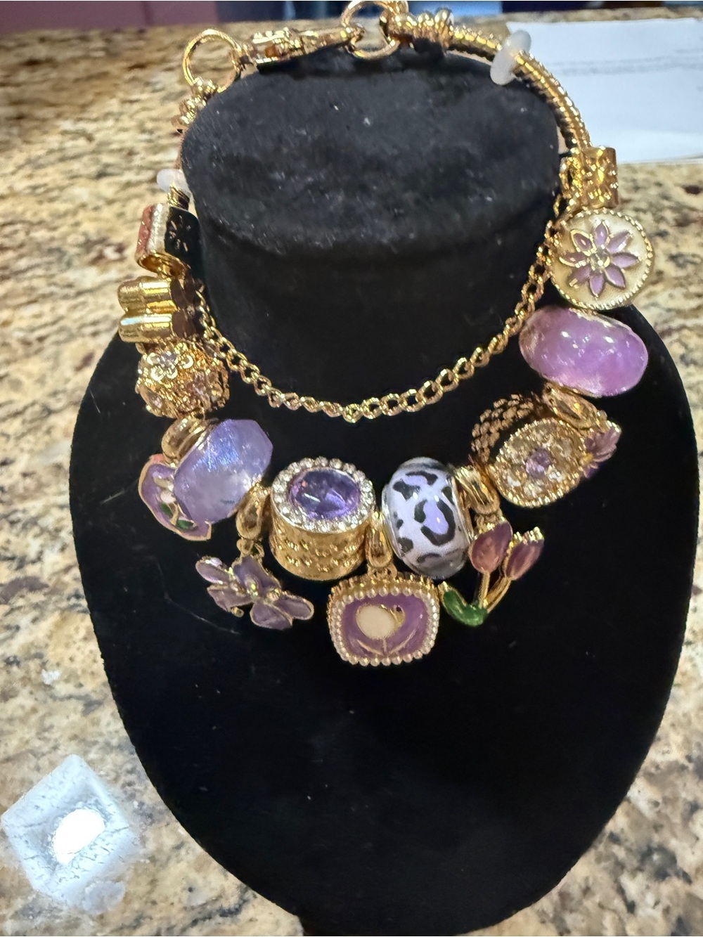 Gold-Tone Purple Floral Charm Bracelet with Enamel Accents